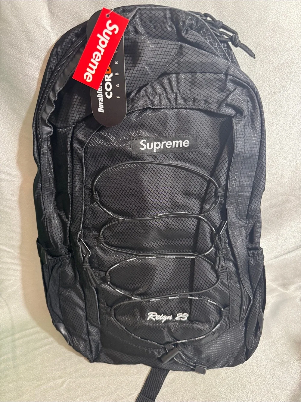 New!🔥Supreme Black Reign 23 Bungee-Front Backpack!🔥